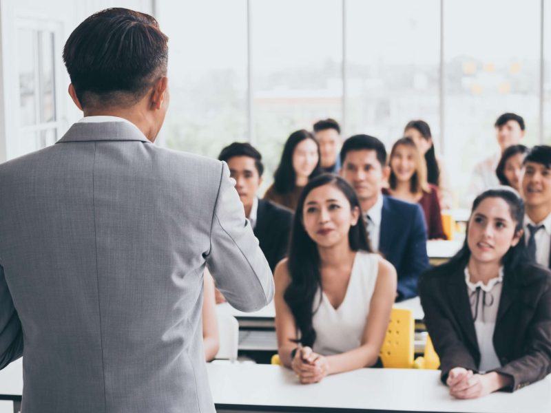 businessman-is-explaining-works-to-officers-while-2022-12-16-03-12-18-utc